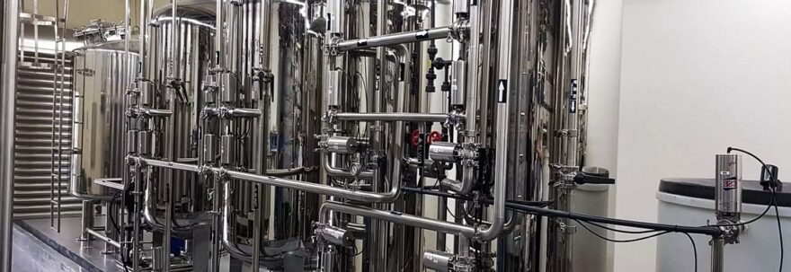 Portada con tubo acero inox industria hidrica