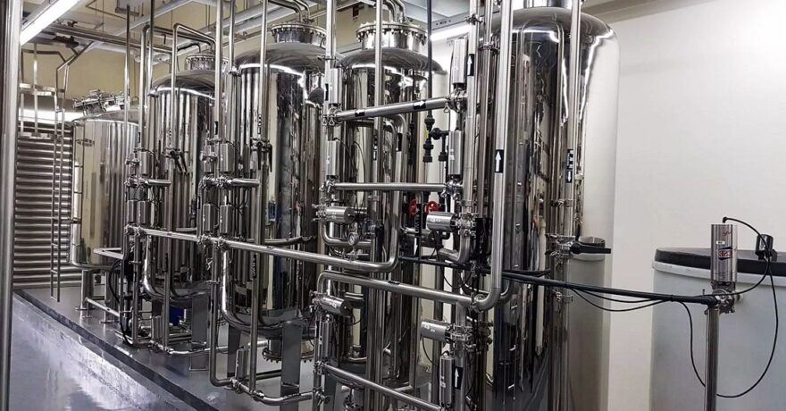 Portada con tubo acero inox industria hidrica